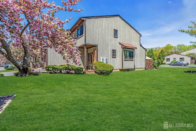contemporary house with a front lawn