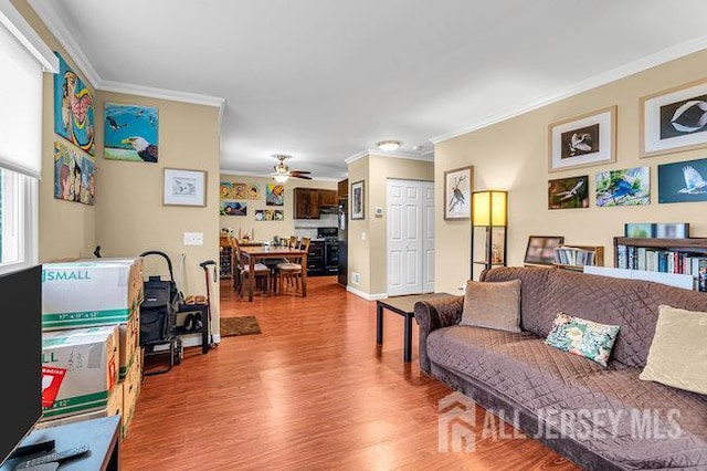 13 Ohio Ct Unit 13, Middlesex, NJ 07747 - living area with ornamental molding, wood finished floors, and ceiling fan