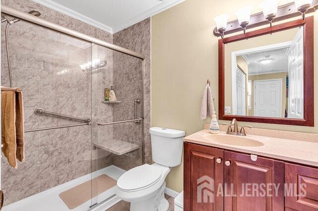 13 Ohio Ct Unit 13, Middlesex, NJ 07747 - full bathroom with ornamental molding, vanity, and a shower stall