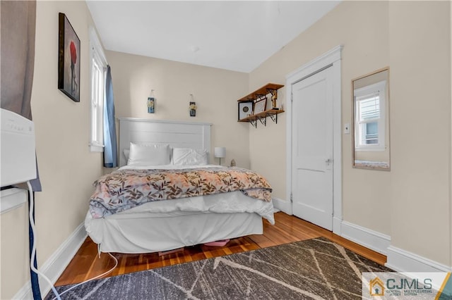 bedroom with light hardwood / wood-style flooring