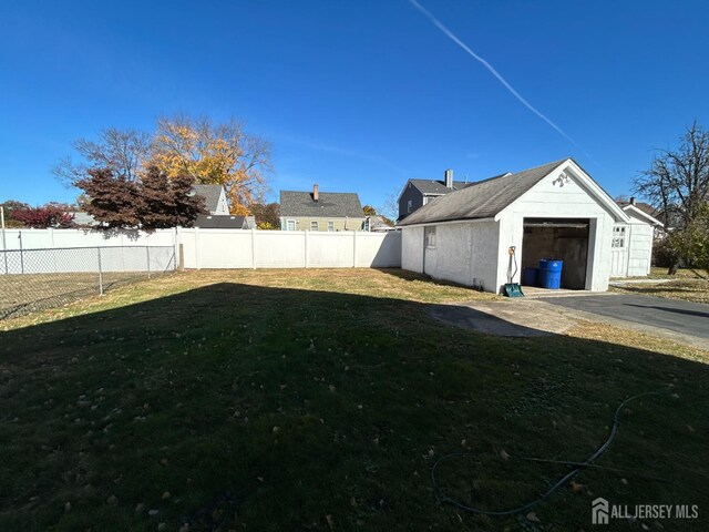 view of yard featuring a garage