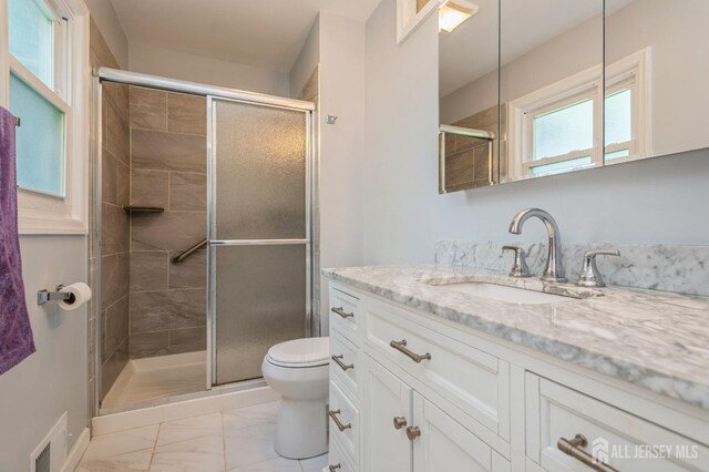 28 Thrush Dr, East Brunswick, NJ 08816 - full bath featuring toilet, vanity, marble finish flooring, and a shower stall