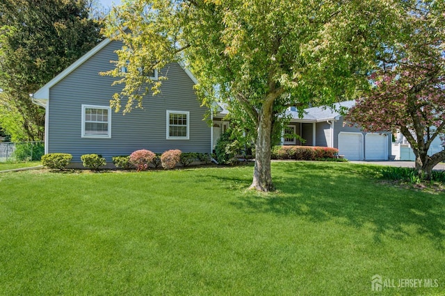 28 Thrush Dr, East Brunswick, NJ 08816 - view of front of house featuring an attached garage and driveway
