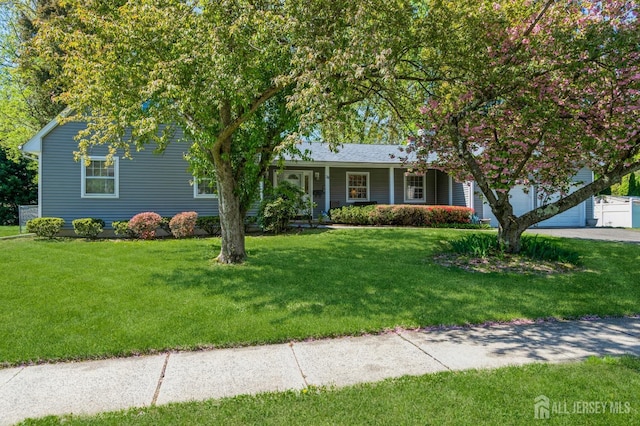 28 Thrush Dr, East Brunswick, NJ 08816 - single story home with a front lawn and covered porch