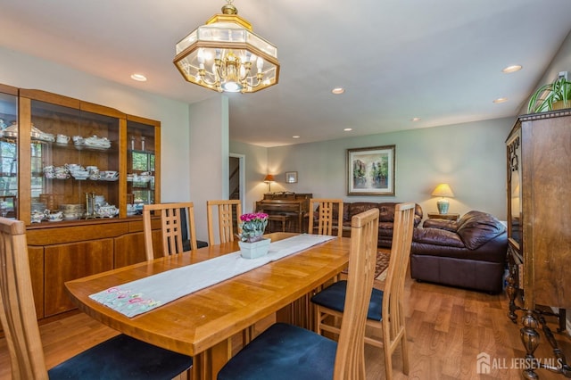 28 Thrush Dr, East Brunswick, NJ 08816 - dining space with wood finished floors, a chandelier, and recessed lighting