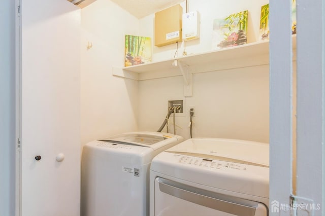 217 Nebula Rd, Piscataway, NJ 08854 - laundry room featuring washer and clothes dryer