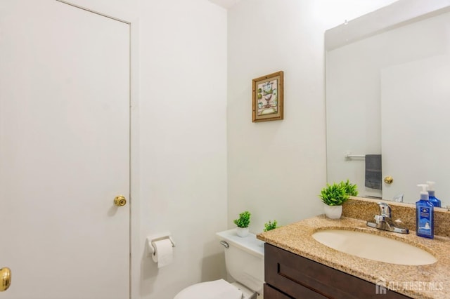 217 Nebula Rd, Piscataway, NJ 08854 - bathroom with toilet and vanity