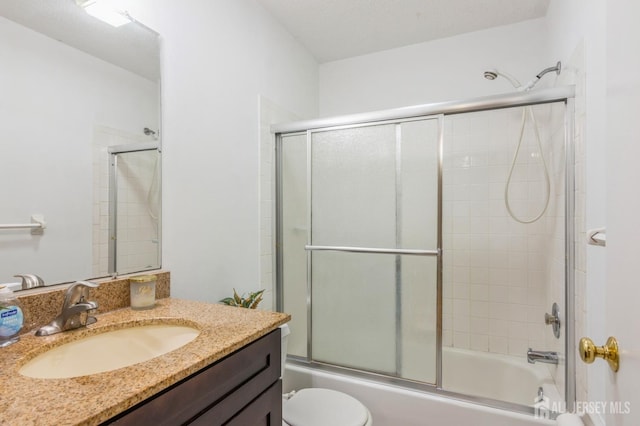 217 Nebula Rd, Piscataway, NJ 08854 - full bath with shower / bath combination with glass door, vanity, and toilet