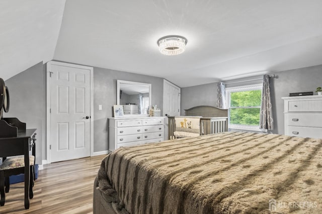 243 Donald Ave, Rahway, NJ 07065 - bedroom with light wood finished floors, vaulted ceiling, and baseboards