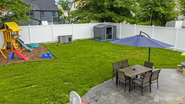 243 Donald Ave, Rahway, NJ 07065 - view of yard featuring a patio, a playground, and outdoor dining space