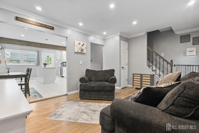 243 Donald Ave, Rahway, NJ 07065 - living room featuring ornamental molding, stairs, light wood-style floors, baseboards, and recessed lighting