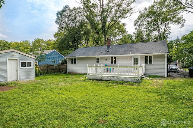 74 Hazelwood Ave, Metuchen, NJ 08840 - rear view of property featuring a deck, a chimney, and a storage unit