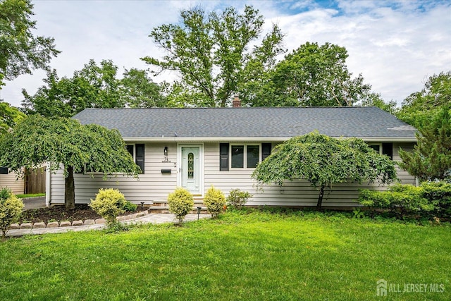 74 Hazelwood Ave, Metuchen, NJ 08840 - ranch-style home featuring a front lawn, a shingled roof, and a chimney