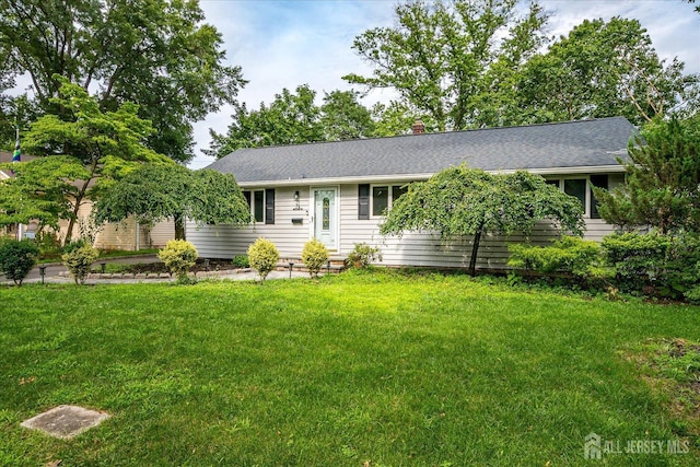 74 Hazelwood Ave, Metuchen, NJ 08840 - ranch-style home featuring a front lawn and a chimney