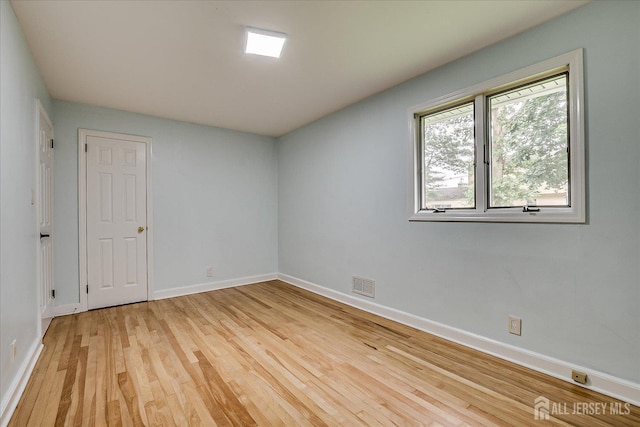 74 Hazelwood Ave, Metuchen, NJ 08840 - spare room with light wood-style floors and baseboards