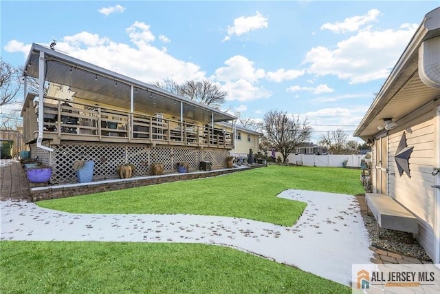 view of yard featuring a wooden deck