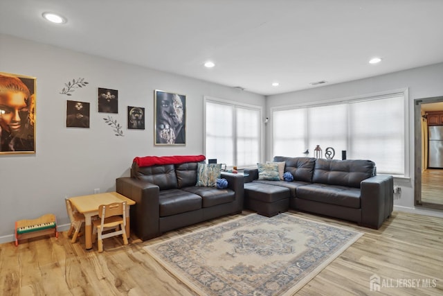 155 Pennsylvania Way N, Brunswick, NJ 08902 - living area featuring light wood-style flooring, baseboards, and recessed lighting
