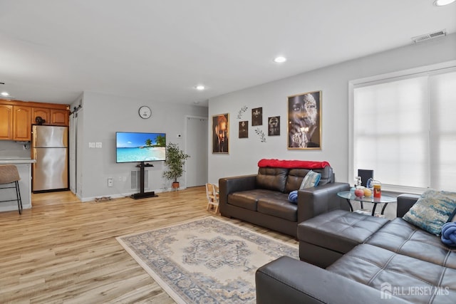 155 Pennsylvania Way N, Brunswick, NJ 08902 - living area with light wood-style floors, recessed lighting, and baseboards