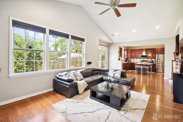 3 Lily Ln, Piscataway, NJ 08854 - living room featuring a ceiling fan, high vaulted ceiling, light wood finished floors, baseboards, and recessed lighting