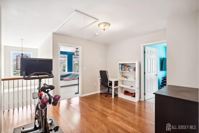 3 Lily Ln, Piscataway, NJ 08854 - exercise area with attic access, wood finished floors, and baseboards