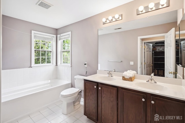 3 Lily Ln, Piscataway, NJ 08854 - full bath with tile patterned flooring, double vanity, a garden tub, toilet, and a walk in closet