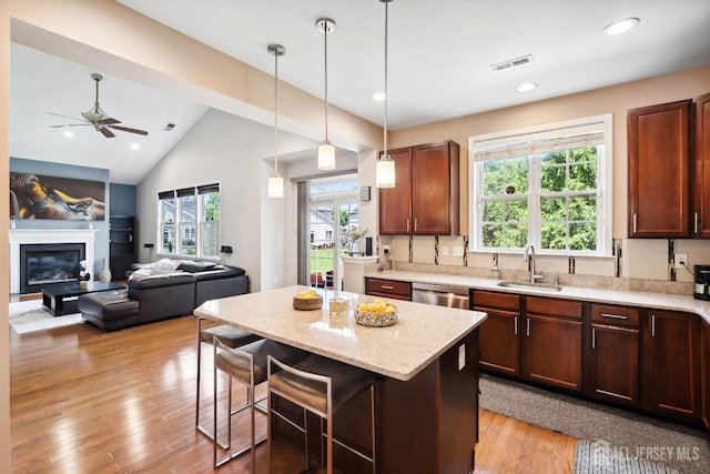 3 Lily Ln, Piscataway, NJ 08854 - kitchen with a sink, stainless steel dishwasher, a breakfast bar area, ceiling fan, and a kitchen island