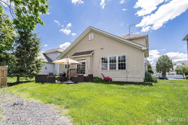 3 Lily Ln, Piscataway, NJ 08854 - rear view of house with a lawn