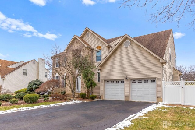 front of property featuring a garage