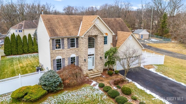 view of front of property with a front lawn