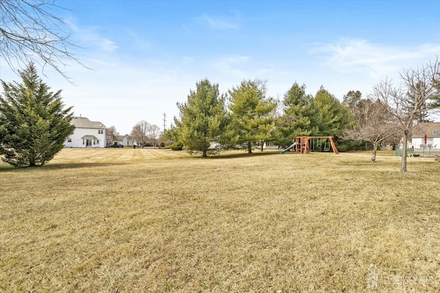 view of yard featuring playground community