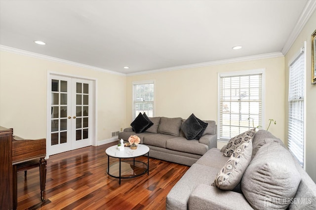 living area featuring recessed lighting, ornamental molding, french doors, and wood finished floors