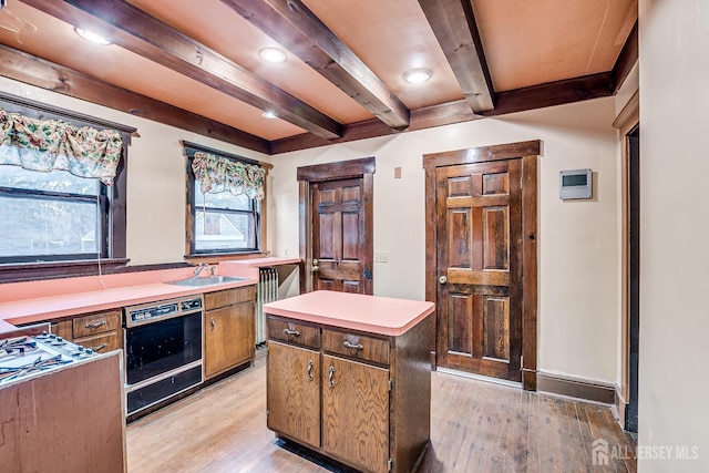 404 Mountainview Ter, Dunellen, NJ 08812 - kitchen with beam ceiling, light wood-type flooring, light countertops, recessed lighting, and wall oven