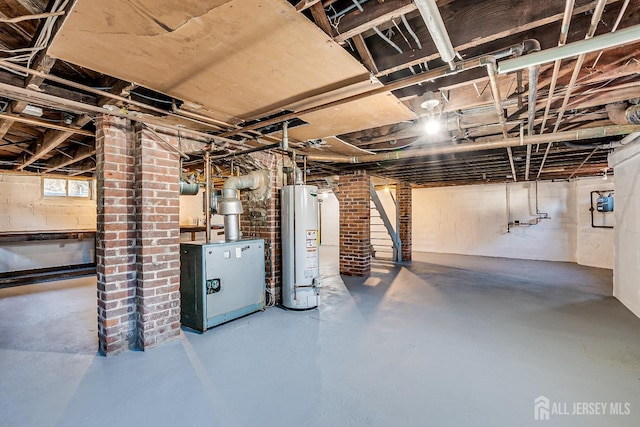 404 Mountainview Ter, Dunellen, NJ 08812 - basement with gas water heater, a heating unit, gas meter, and stairway