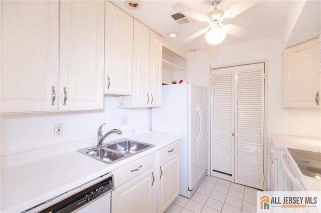50 Prospect St Unit 09, Metuchen, NJ 08840 - kitchen with white appliances, ceiling fan, light tile patterned floors, light countertops, and white cabinetry