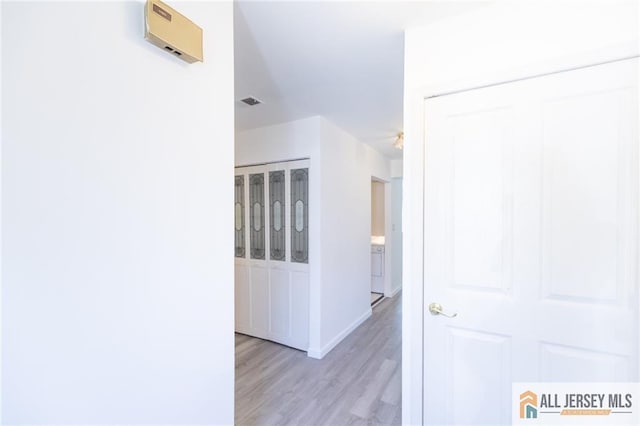 50 Prospect St Unit 09, Metuchen, NJ 08840 - hall with light wood-style flooring and baseboards