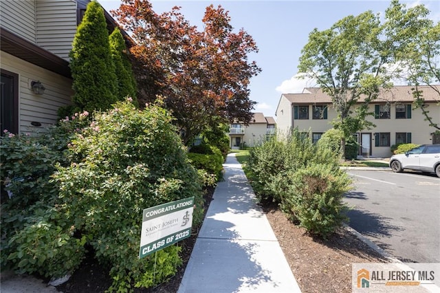 50 Prospect St Unit 09, Metuchen, NJ 08840 - surrounding community with uncovered parking and a residential view