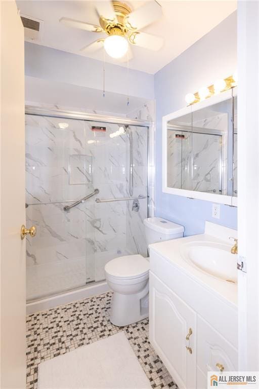 50 Prospect St Unit 09, Metuchen, NJ 08840 - bathroom with a ceiling fan, a marble finish shower, and vanity
