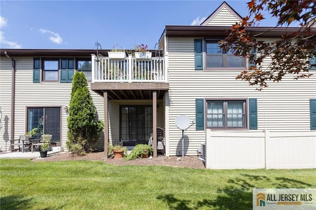 50 Prospect St Unit 09, Metuchen, NJ 08840 - rear view of house with a yard and a balcony