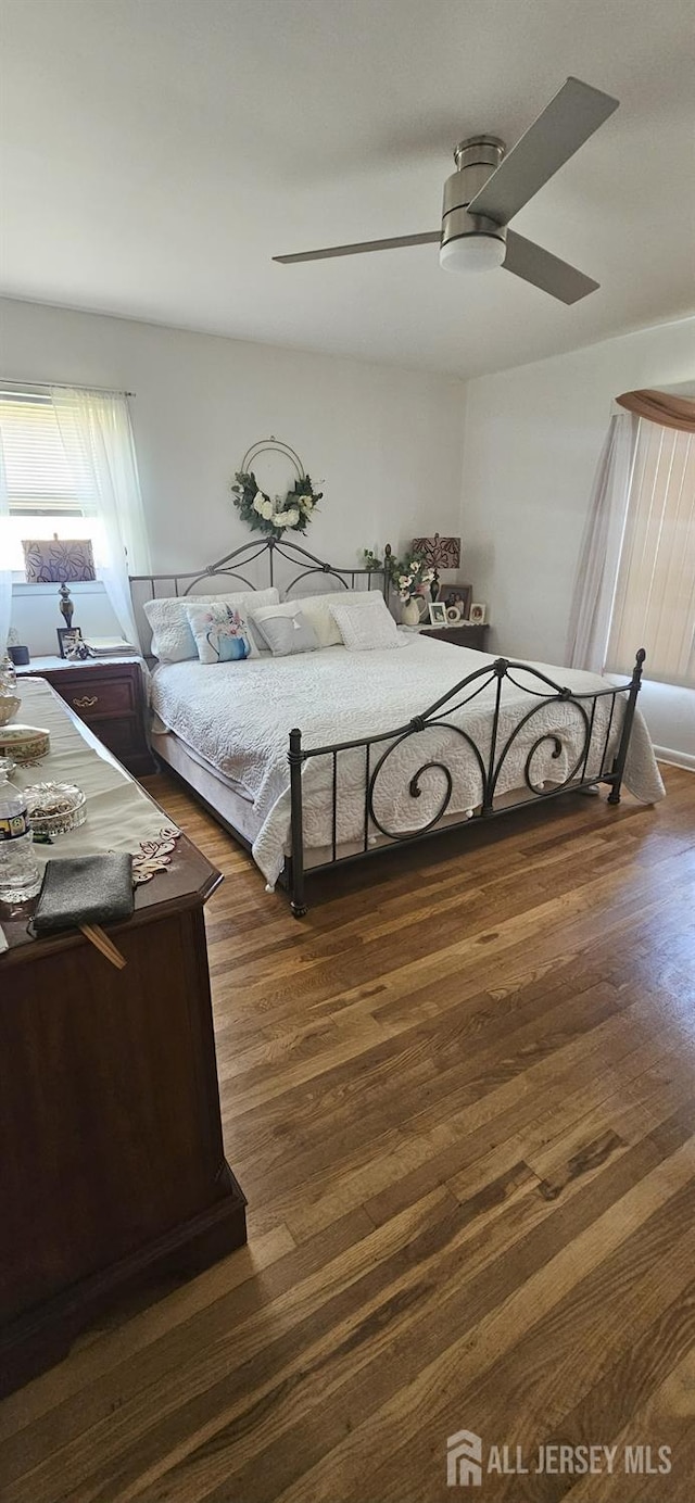 789 Barry Ave, Perth Amboy, NJ 08861 - bedroom featuring wood finished floors and ceiling fan