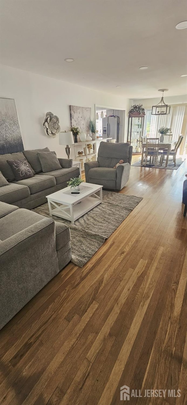 789 Barry Ave, Perth Amboy, NJ 08861 - living area with hardwood / wood-style floors