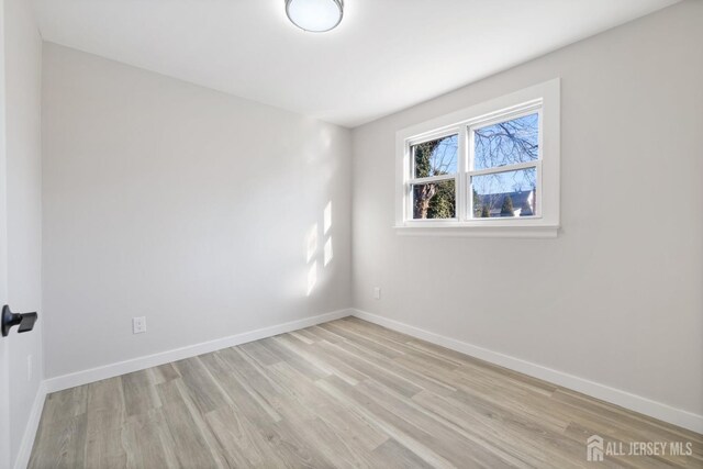 empty room featuring light hardwood / wood-style floors