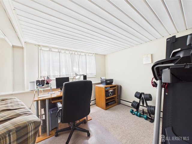 carpeted home office with baseboard heating