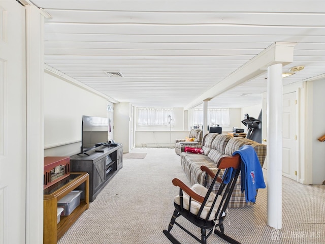 carpeted living area with visible vents