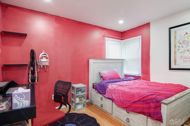 bedroom featuring light hardwood / wood-style floors