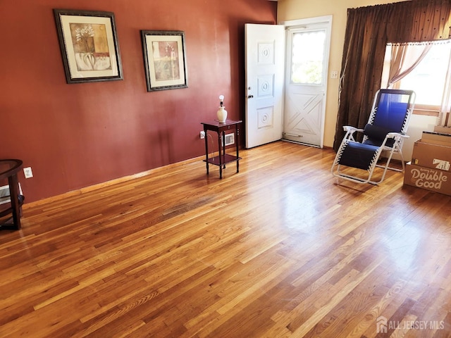 694 Vincent Pl, Perth Amboy, NJ 08861 - living area featuring wood finished floors