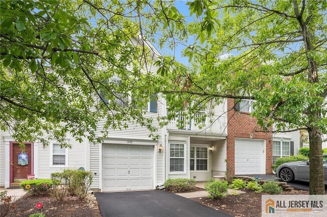 202 Canterbury Way S, Brunswick, NJ 08540 - townhome / multi-family property with a garage and driveway