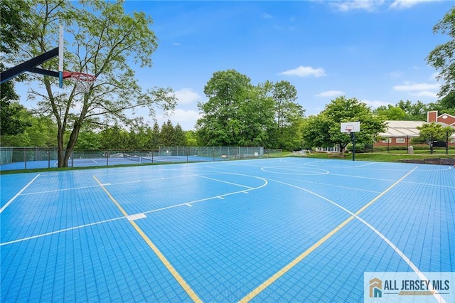 202 Canterbury Way S, Brunswick, NJ 08540 - view of sport court featuring community basketball court and view of wooded area