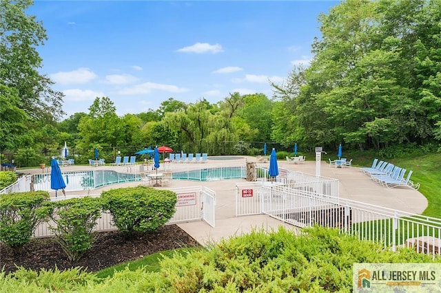202 Canterbury Way S, Brunswick, NJ 08540 - community pool featuring a patio area