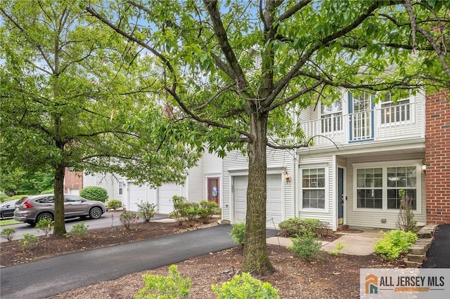 202 Canterbury Way S, Brunswick, NJ 08540 - view of front of home featuring driveway and a balcony