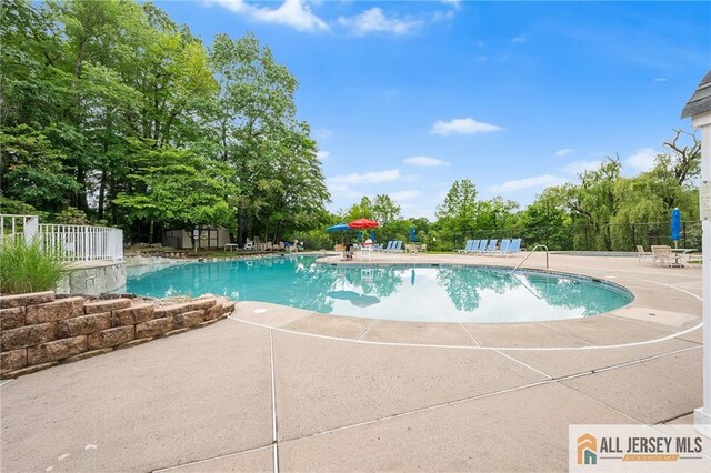202 Canterbury Way S, Brunswick, NJ 08540 - community pool with a patio